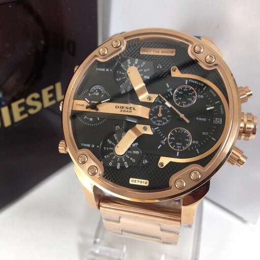 the watch is a luxury watch with a gold finish and a black dial.