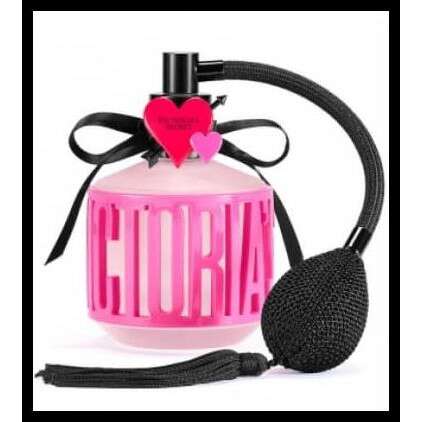 pink perfume bottle with black ribbon and pink heart.