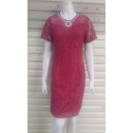 a dress made of lace and sequins.