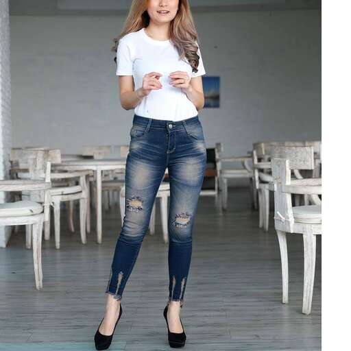 a white tee with ripped jeans