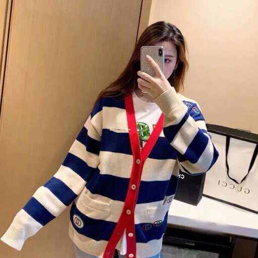 person, a model, shows off her new costume.