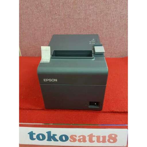 a close up of a printer on a red carpet