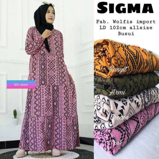 a woman in a long dress and a scarf.