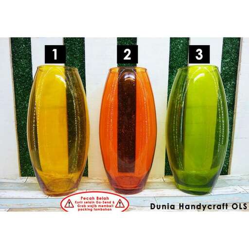 three glass vases with different colored glass vases.
