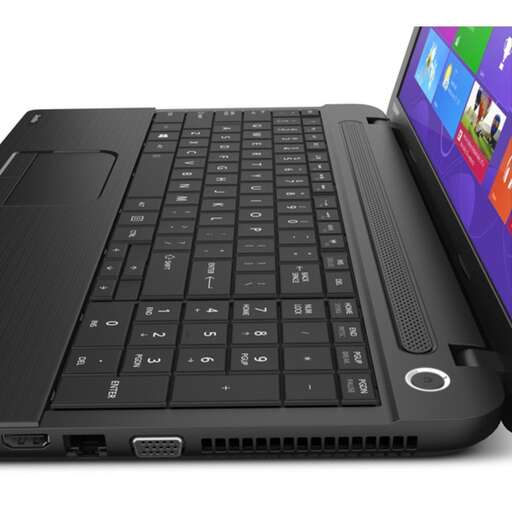 a laptop computer with a touch screen and a cell phone.