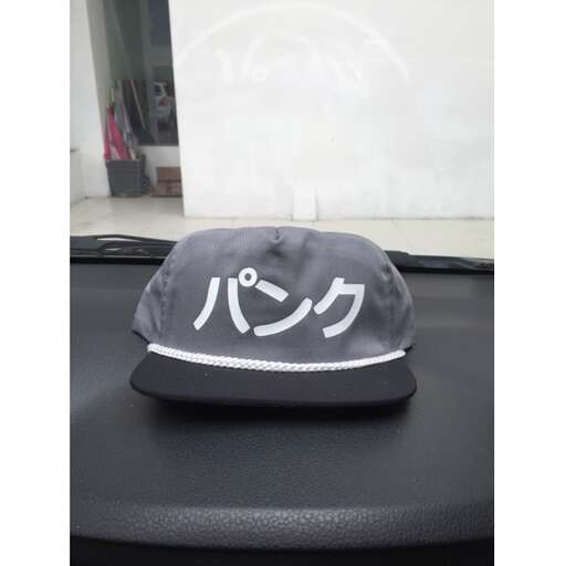 a hat on the dashboard of a car.