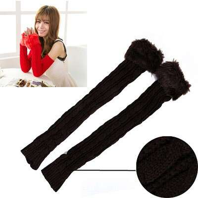 black and white knitted scarf with a bow in the middle