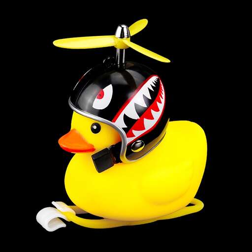 a yellow rubber duck with a big teeth and big teeth.