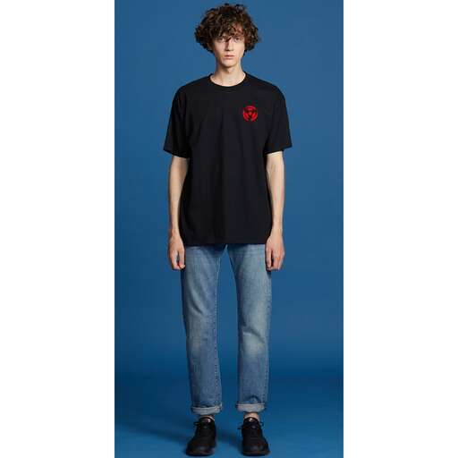 a boy in a black t - shirt