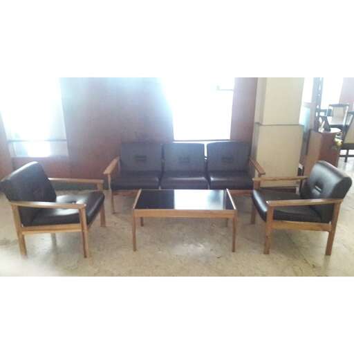 a living room with two chairs and a table