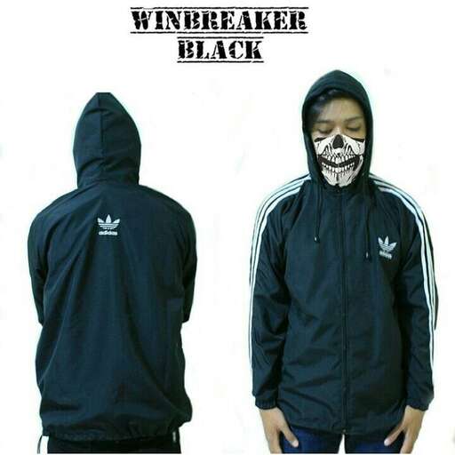 black coat with white face and logo on the front.