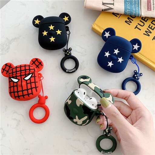 a person is putting a keychain into a pocket.