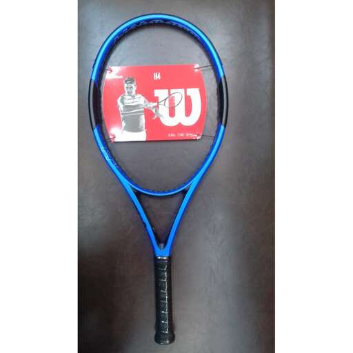 a tennis racket with a logo on it.