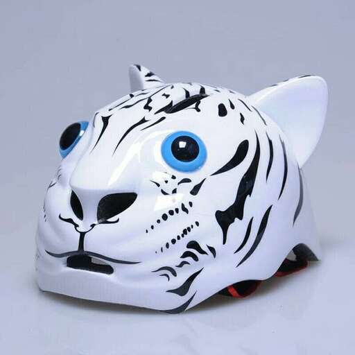 a white tiger mask with a blue eye and a black and white tiger on the front.