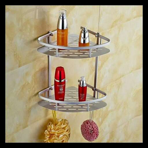 a shelf with bottles on it and a bottle of shampoo on it.