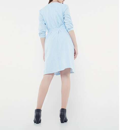 the dress is made from a vintage denim dress