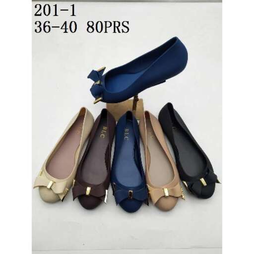 a pair of shoes with gold trim.