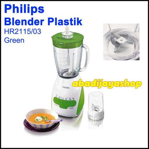 a blender with a green lid and a glass jar of food.