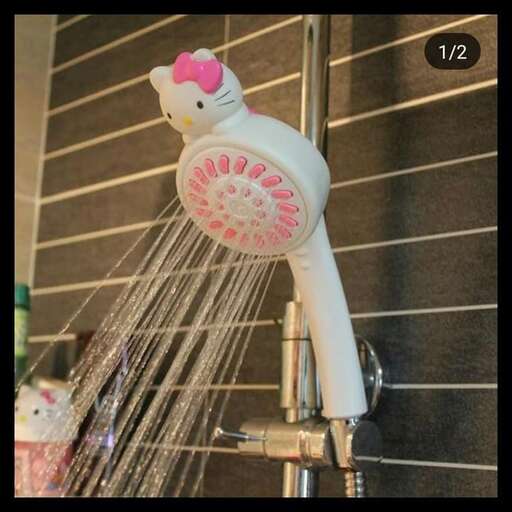shower head with a cute little girl