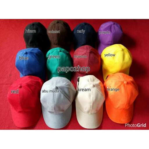 a variety of colored baseball caps on a red background.