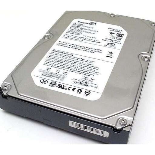 a computer with a battery sitting on top of it.