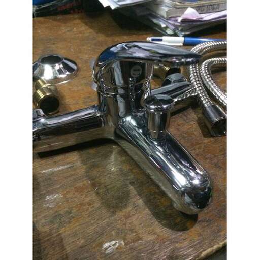 a close up of a faucet on a table