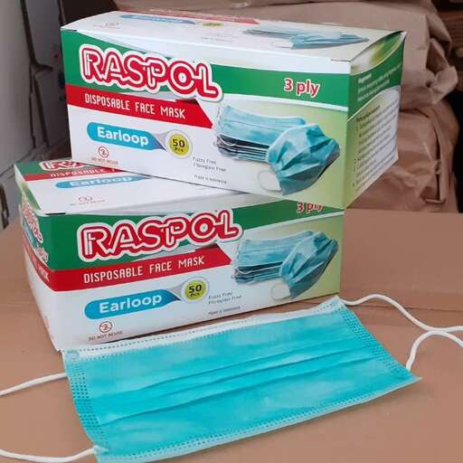 a stack of boxes with a toothbrush holder on top of them.