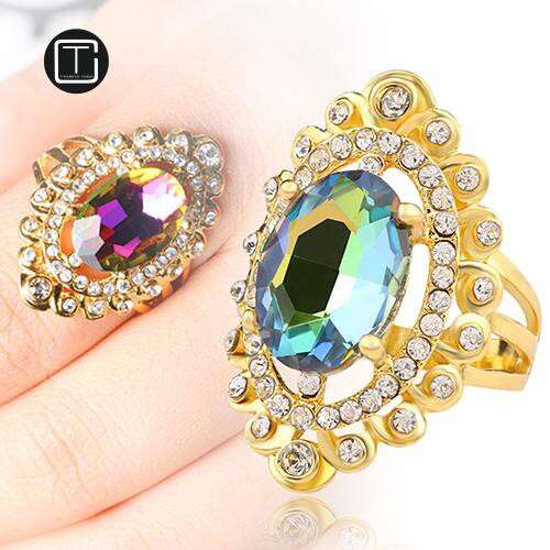 a ring with a carat emerald and diamond