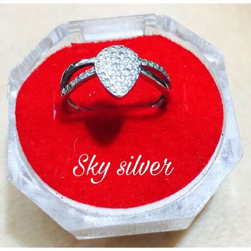silver ring with a diamond