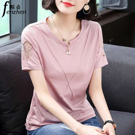 a cute blouse with a cute necklace.
