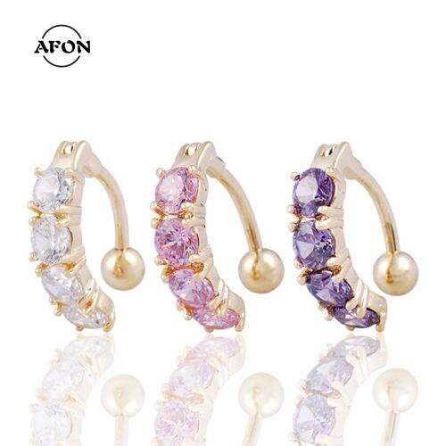 a set of 14k yellow gold plated earrings with pink sapphires and diamonds in 14k gold.