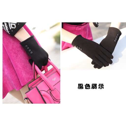 a woman's hand in black gloves