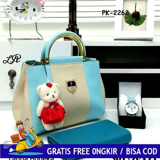 a purse with a teddy bear on it and a clock on the side.