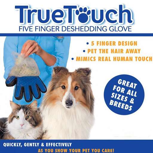 a woman is holding a cat paw in her glove.