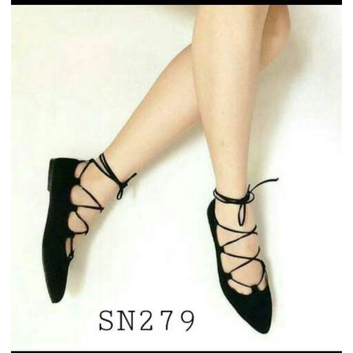 black high heeled shoes with laces and a lace - up ankle.