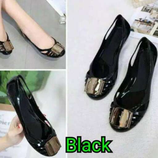 black leather shoes with gold trim.