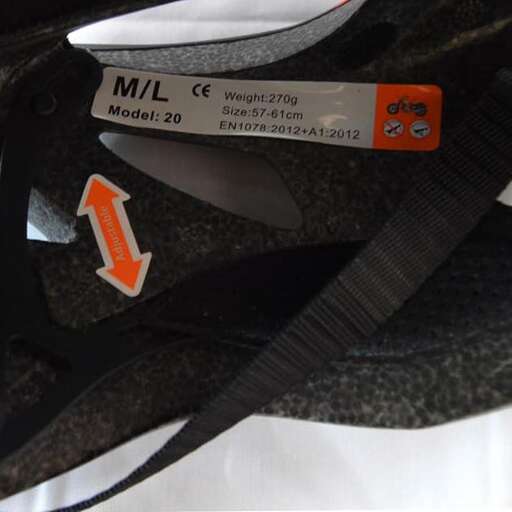 a pair of black and orange straps with orange arrows.