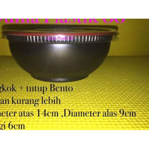 a bowl with a pink stripe on the bottom.