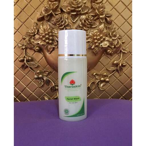 a bottle of shampoo sitting on a table.