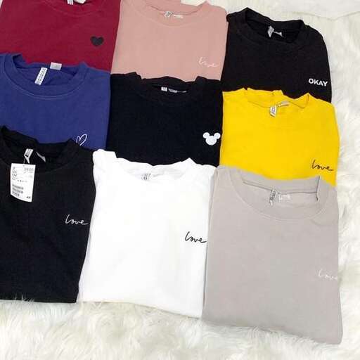 a selection of shirts, shirts, and shirts.