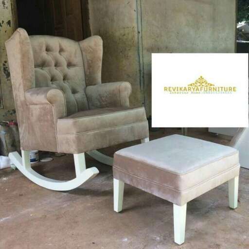 a chair and ottoman in a room