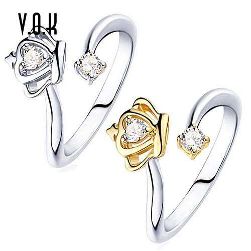 a ring that is made of 14k yellow gold and diamonds.