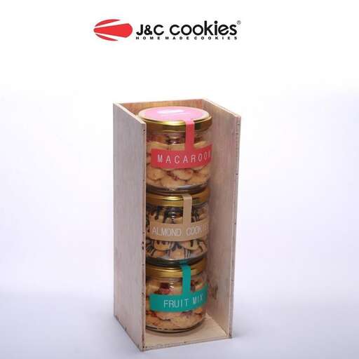 a box of cookies in a brown paper bag.