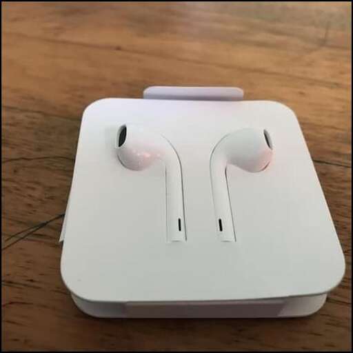 the headphones are in a white case.