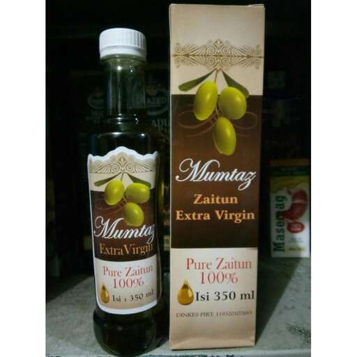 a bottle of olive oil and a bottle of wine.