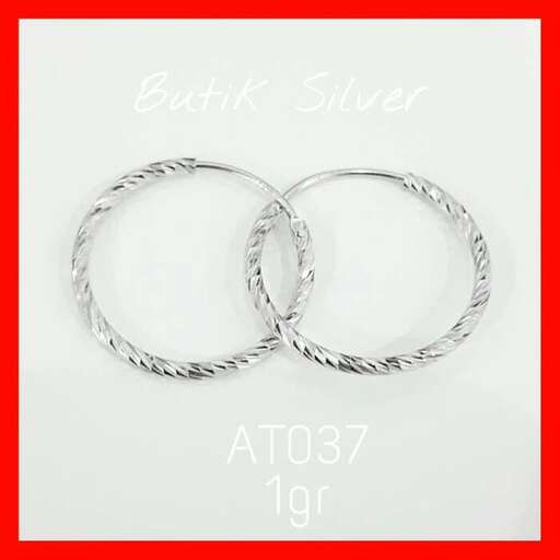 a pair of silver bracelets