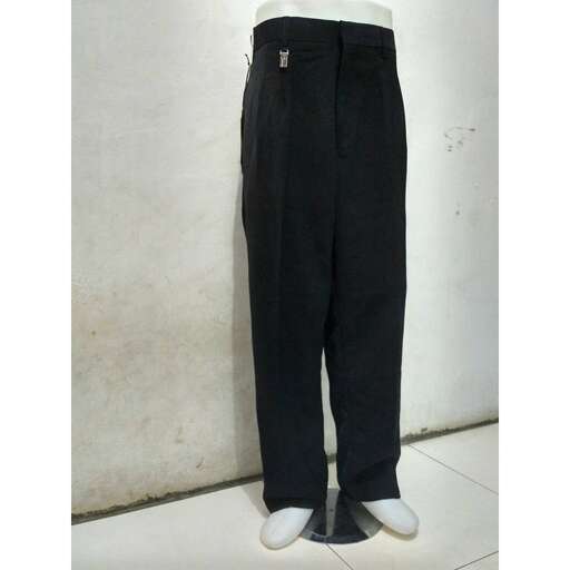 a pair of black pants with white soles and a pair of white shoes.