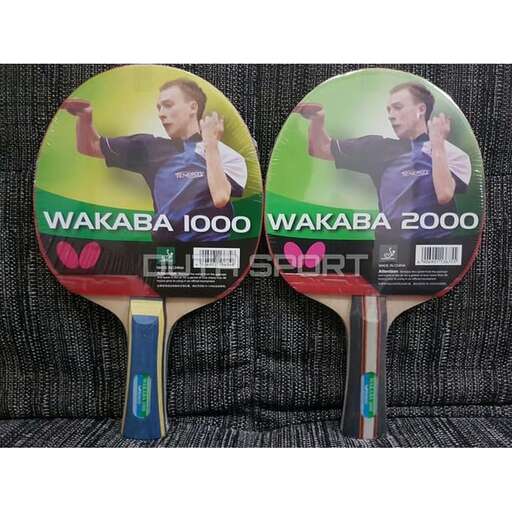 two tennis rackets with a picture of a man in a blue shirt.