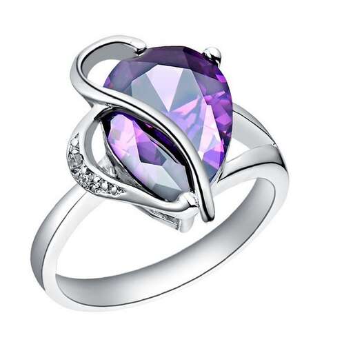 this ring is made with a sapphire and diamonds.