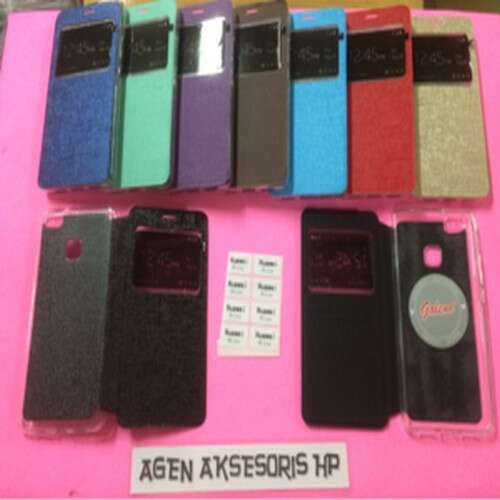 a display of various cell phones on a pink background.